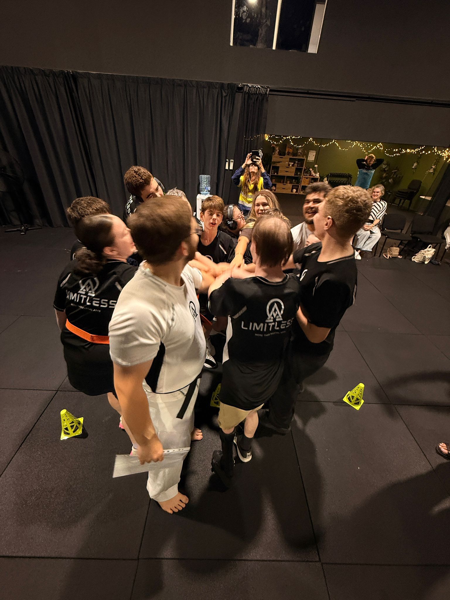 Instructors and students together after a Limitless Impact class